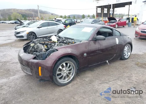 2003 Nissan 350Z Touring z USA, uszkodzony, nr VIN JN1AZ34E43T015351